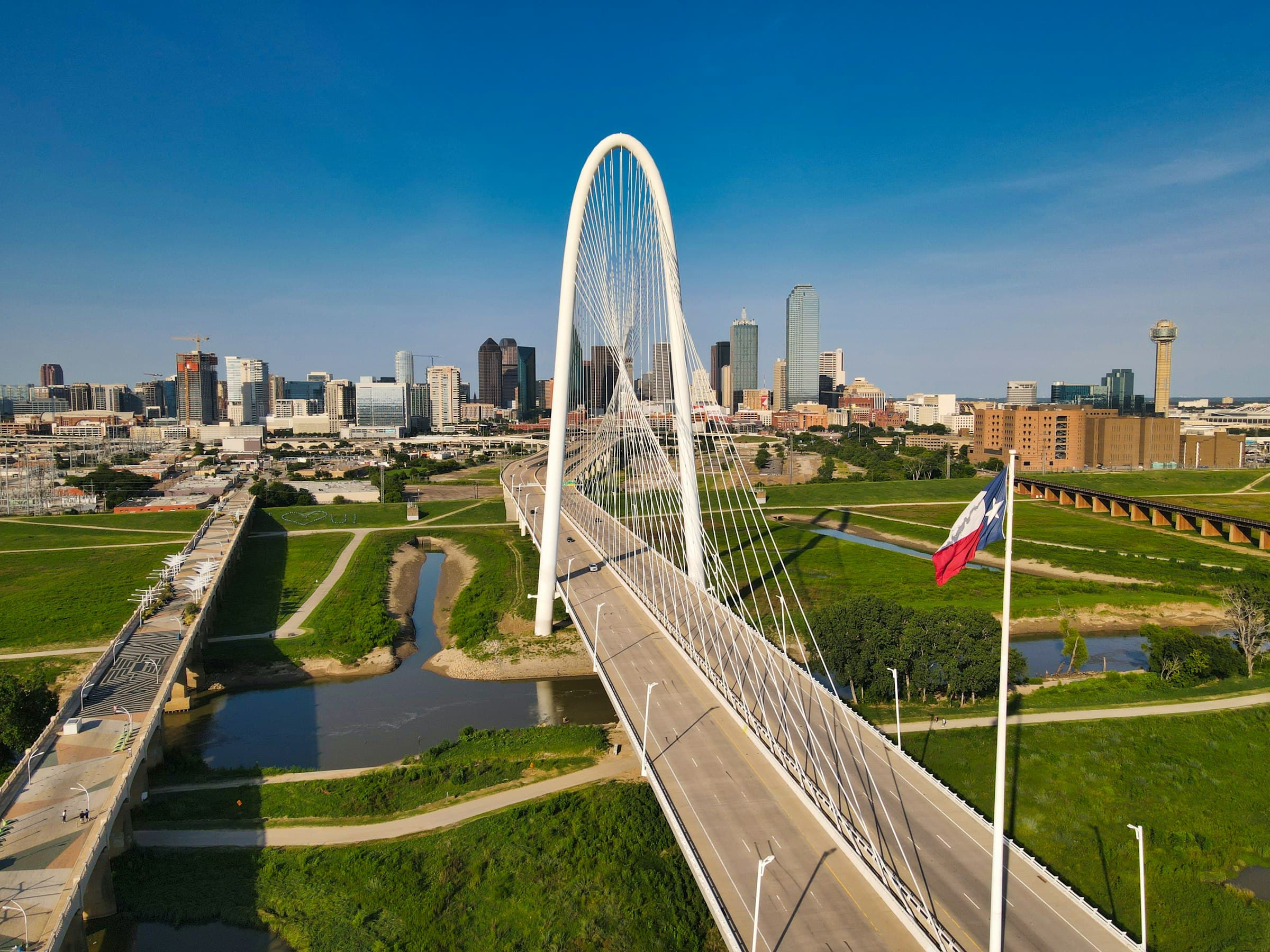 The Dallas skyline at dusk over the Trinity River
